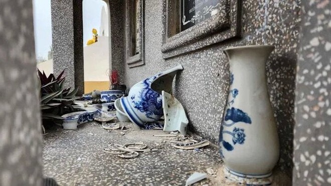 Bắt nghi phạm đập phá hơn 40 ngôi mộ ở Hà Nội - Ảnh 1.
