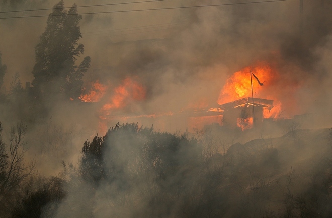 Cháy rừng thảm khốc ở Chile, ít nhất 46 người thiệt mạng - Ảnh 1.