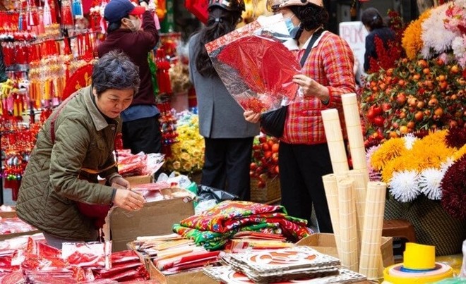 Không khí Tết Nguyên đán rộn ràng ở nhiều nơi trên thế giới - Ảnh 1.