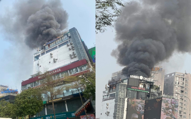 Clip, ảnh: Cận cảnh vụ cháy lớn tại Trung tâm thương mại ở Hà Nội, từ xa người dân vẫn ngửi mùi khét - Ảnh 1.