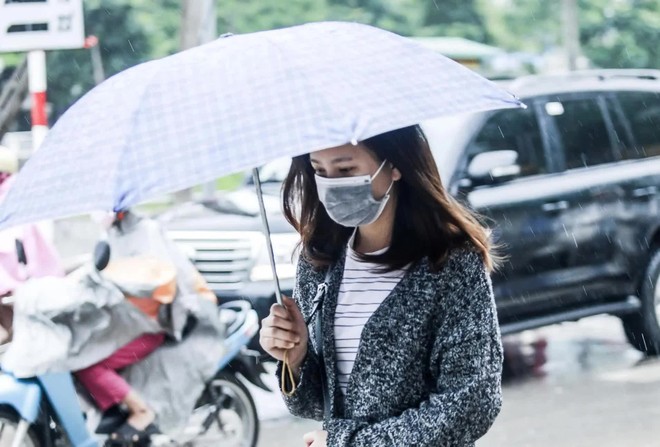 Không khí lạnh tràn về chấm dứt ác mộng nồm ẩm, Hà Nội chuyển mưa rét - Ảnh 2.