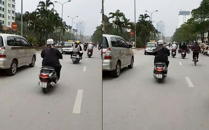 Vác thanh thép dài trên vai, người đàn ông vẫn "tự tin" 2 tay điều khiển xe máy khiến người đi đường hoảng sợ