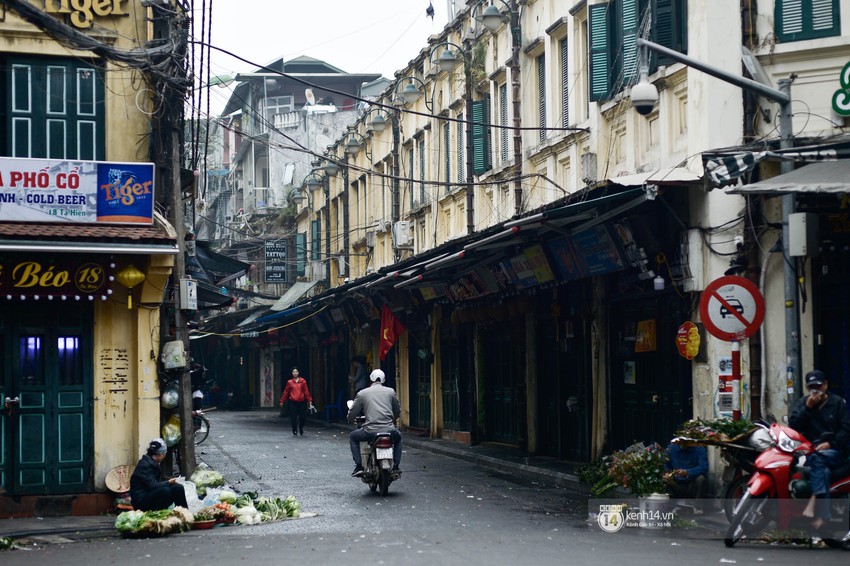 C&oacute; một H&agrave; Nội s&aacute;ng 30 Tết vắng lặng, an nhi&ecirc;n v&agrave; rất... H&agrave; Nội! - Ảnh 4.