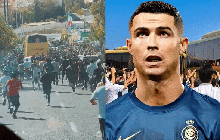 Ronaldo được chào đón đặc biệt khi đến Iran thi đấu: Hàng trăm fan đuổi theo xe bus, vây kín khách sạn