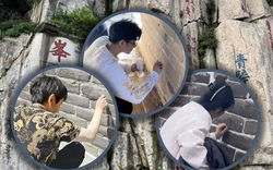 Khắc chữ 'thành công’, ‘may mắn’ lên di tích cổ để mong đổi vận, 2 người đàn ông bị phạt tiền, kèm lao động công ích hàng nghìn giờ