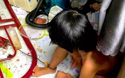 Vụ xích chân con gái 9 tuổi vào giường: Công an triệu tập người cha