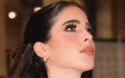 Hoa hậu Hoàn vũ lặng lẽ về nước