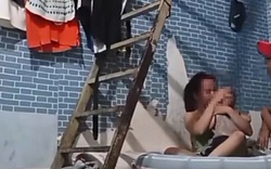 Vụ cô gái ôm con nhỏ bị đánh tới tấp: Đã bắt được “Trung cá chép”