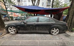 Ô tô Mercedes S63 bị bỏ quên 10 năm trên vỉa hè Hà Nội là tang vật vụ án