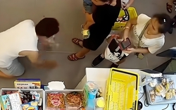 Con trai nói dối để lấy kẹo, người mẹ đôi co rồi ép chủ cửa hàng quỳ lạy xin lỗi: "Mẹ thế này, con hỏng cũng không lạ"