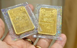 Vàng giảm, bán hay giữ?