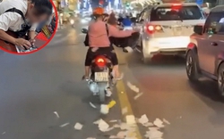 Người phụ nữ rải giấy tiền tứ tung ra giữa đường ở TP.HCM: Bất ngờ nguồn cơn và cái kết
