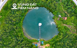 Ngắm nút giao vừa có hồ nước, rừng cây xanh và nhà dân trên đại lộ dài nhất Việt Nam