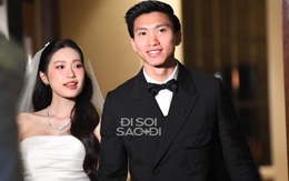 Cô dâu Doãn Hải My xuất hiện với visual đỉnh cao, nắm chặt tay Đoàn Văn Hậu bước ra lễ đường
