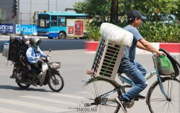 Ngày nghỉ lễ đầu tiên “đỏ rực” 45 độ C, Hà Nội như "lò bát quái" khiến người dân không dám ra đường