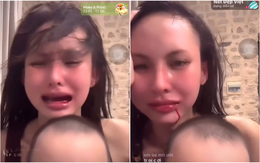 Lâm Minh miệng chảy máu, ôm con khóc trên livestream