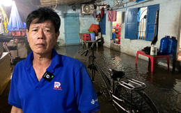 "Mưa xuống là không dám ngủ": Dân lao động TP.HCM vật lộn trắng đêm vì ngập, ngao ngán "chạy" đồ, tát nước