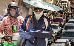 Hà Nội cuối tháng 9 vẫn “bật chế độ mùa hè”: Ngoài trời nắng rát mặt, người dân ngóng cái se lạnh của mùa Thu