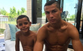 Con trai Ronaldo cạo đầu y hệt bố