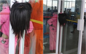 Trung Quốc: Mải đùa nghịch, bé gái 13 tuổi kẹt cứng đầu vào giữa cánh cửa kính