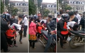 Cô gái bị kéo tuột váy vì nhóm thanh niên đi "bắt vợ" tại trung tâm chợ thị trấn Phù Yên