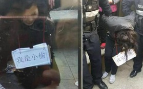 Trộm xe đạp điện, người phụ nữ Trung Quốc bị làm nhục bằng cách đeo tấm biển "tôi là kẻ trộm"