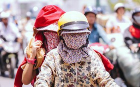 Chùm ảnh: Sài Gòn bước vào đợt nắng nóng đổ lửa, những "ninja" xuống phố