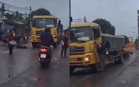 Hà Nội: Cô gái bất ngờ ra giữa đường chặn đầu xe tải rồi đánh đu lên gương xe khiến nhiều người hoảng hốt