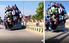 Hình ảnh kinh hoàng: Hàng chục sinh viên Ấn Độ đu bám theo xe buýt để đến trường cho kịp kỳ thi