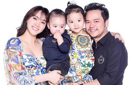 Con trai Trang Nhung lần đầu lộ diện trong bộ ảnh gia đình, mới 1 tuổi đã mặc đồ hiệu tạo dáng đáng yêu