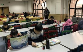 Không có thời gian mở lì xì, trẻ em Trung Quốc lao đầu vào học thêm xuyên Tết