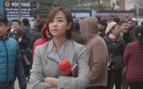 Nữ phóng viên Hàn Quốc xinh đẹp nổi bật giữa đám đông khi tác nghiệp sự kiện đón Nhà lãnh đạo Triều Tiên tại ga Đồng Đăng