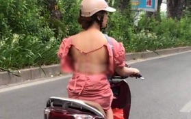 Cô gái mặc váy hớ hênh, lộ toàn bộ lưng trần phản cảm khi chạy xe máy khiến nhiều người đỏ mặt quay đi