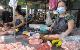 Giá heo hơi xuống đáy, giá thịt heo "trên trời"