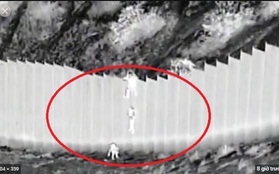 Video kẻ buôn người thả trẻ nhỏ từ rào cao 4m để vào đất Mỹ