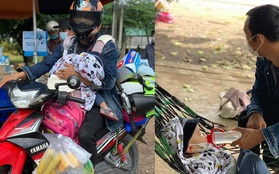 Người bố một mình địu con 2 tuổi đi xe máy hồi hương: "Nó nhớ hơi mẹ, cứ khóc suốt"
