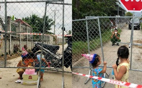 Chiến sĩ CA thổi nến mừng sinh nhật con gái ngay tại hàng rào phong tỏa, cái vẫy tay từ xa khiến bao người thổn thức