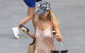 Rita Ora mặc váy ngủ không nội y ra phố