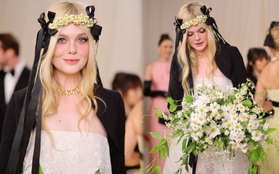 Elle Fanning tinh tế chọn hoa cúc làm điểm nhấn khi xuất hiện tại Met Gala 2023