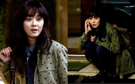 Jang Nara ngồi xổm nghe điện thoại giữa phố