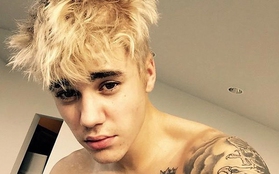 Justin Bieber nhuộm tóc vàng bạch kim để quên Selena Gomez