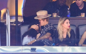 Justin Bieber công khai ngồi lên đùi, hôn mẫu nữ gợi cảm