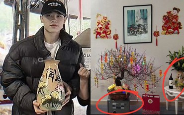 Không ai như Đình Bắc: Mang két sắt làm giá đỡ chậu hoa đào, mặc đồ kín bưng mua bình cắm hoa Tết cũng viral