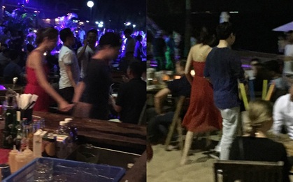 Hoa hậu Thu Thảo và bạn trai thân mật ngoài bãi biển đông người