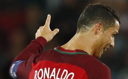 Nghĩa cử đẹp sau kiểu tóc lạ của Ronaldo ở Euro 2016