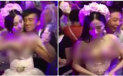 Sự thật về cô dâu kỳ quái cho quan khách sờ ngực để kiếm tiền đi du lịch trăng mật