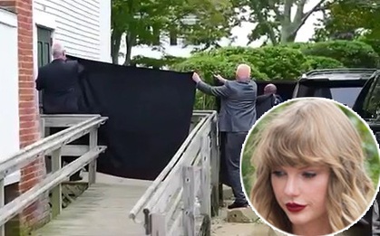 Dùng vải che kín để trốn fan đứng chờ ngoài trời, Taylor Swift bị la ó chê bai vì chảnh