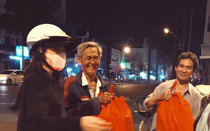 Đông Nhi giản dị đi trao quà cho người vô gia cư giữa đêm, san sẻ yêu thương những ngày giáp Tết