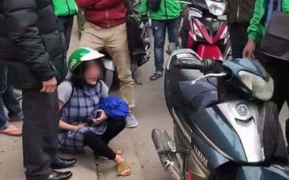 Xôn xao câu chuyện thai phụ khóc nức nở khi bị tài xế GrabBike bắt đền 700.000 đồng vì lỡ để khăn quàng cổ quấn vào bánh xe máy