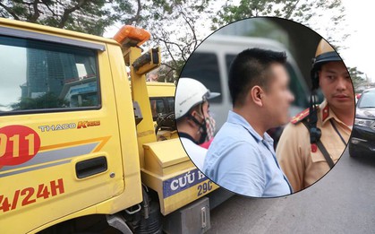 Hà Nội: Tài xế dừng đèn đỏ rồi ngủ quên trong ô tô nửa tiếng, CSGT phải đến cẩu cả xe cả người đi